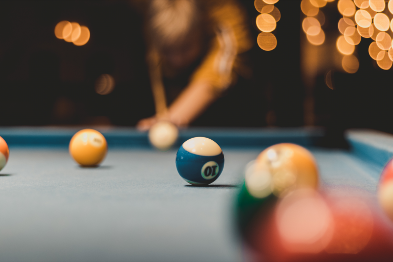 Pool table with various billiard balls